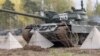 Латвия строит "зубы дракона" с помощью украинцев. Репортаж с предприятия по производству противотанковых укреплений 